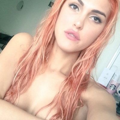 Slender and beautiful Blonde shemale Bella Montiel